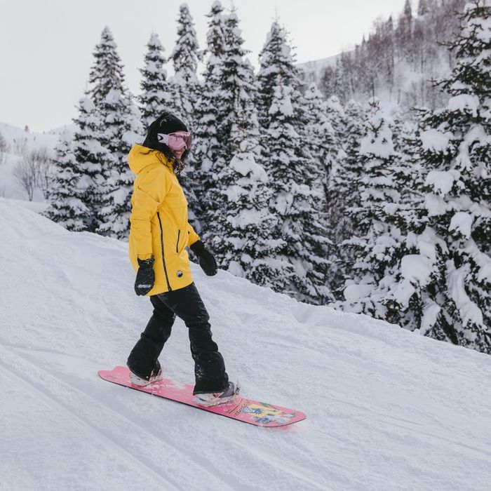 A women snowboarding