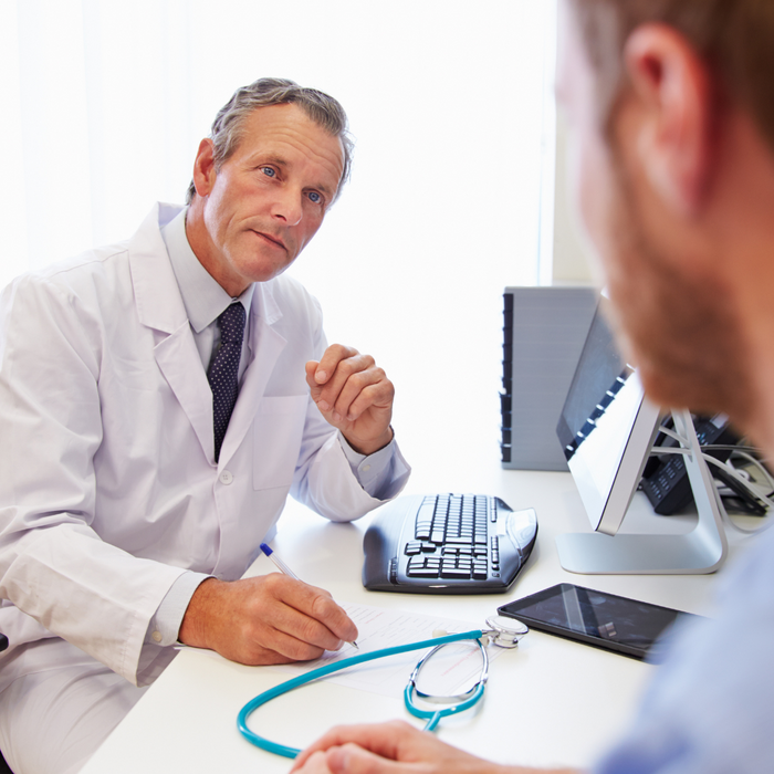 Doctor speaking to a patient