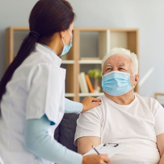 Nurse speaking to patient
