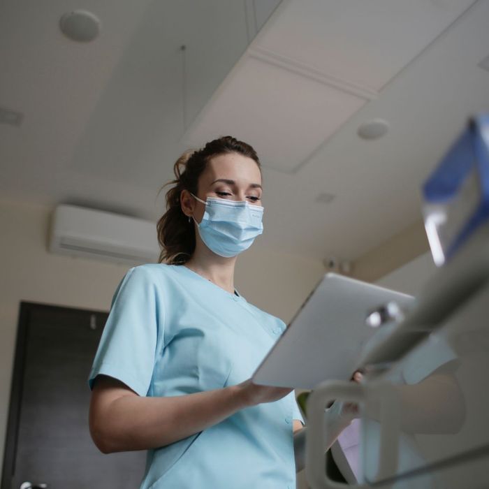 A nurse looking over results 