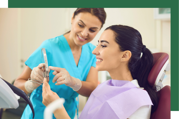 dentist showing patient teeth