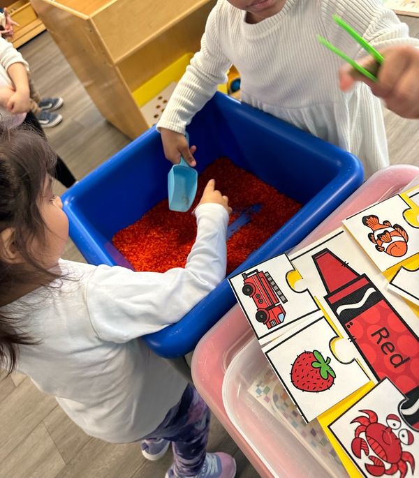child working on creative project in preschool child working on creative project in preschool