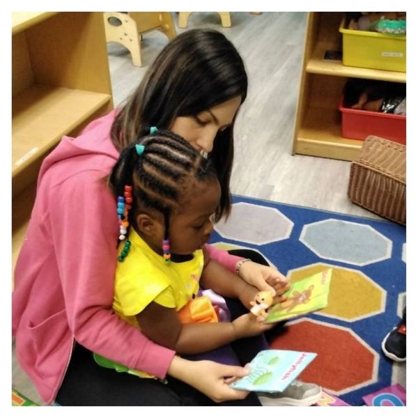 teacher reading with child 