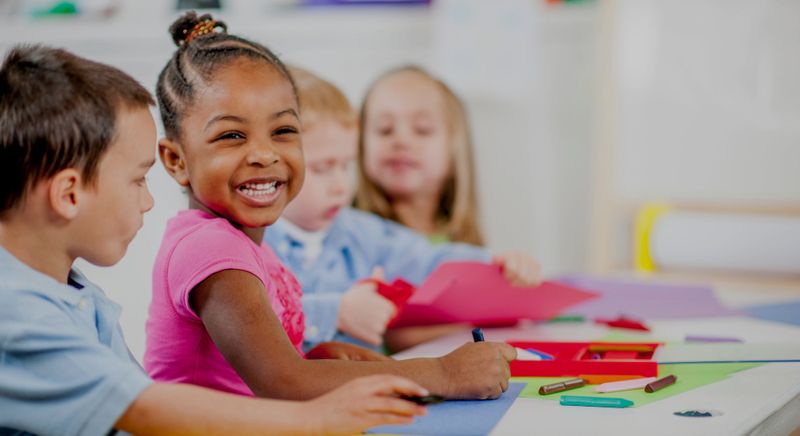 smiling kid in class 