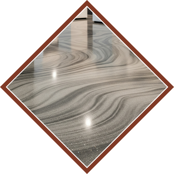 A close-up of a seamless, high-gloss epoxy floor, showcasing its reflective surface and flawless finish. Showrooms1.png