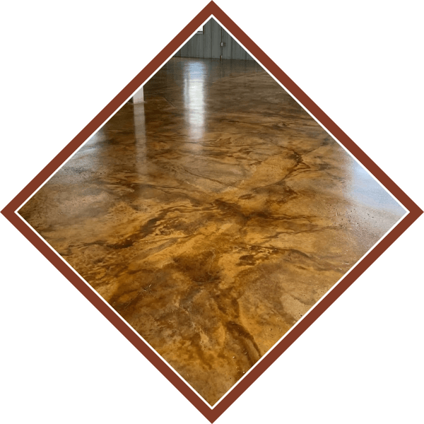 warm amber and charcoal concrete stains blending seamlessly across polished cement