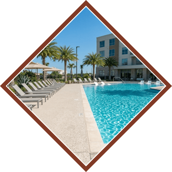 concrete pool deck at a resort