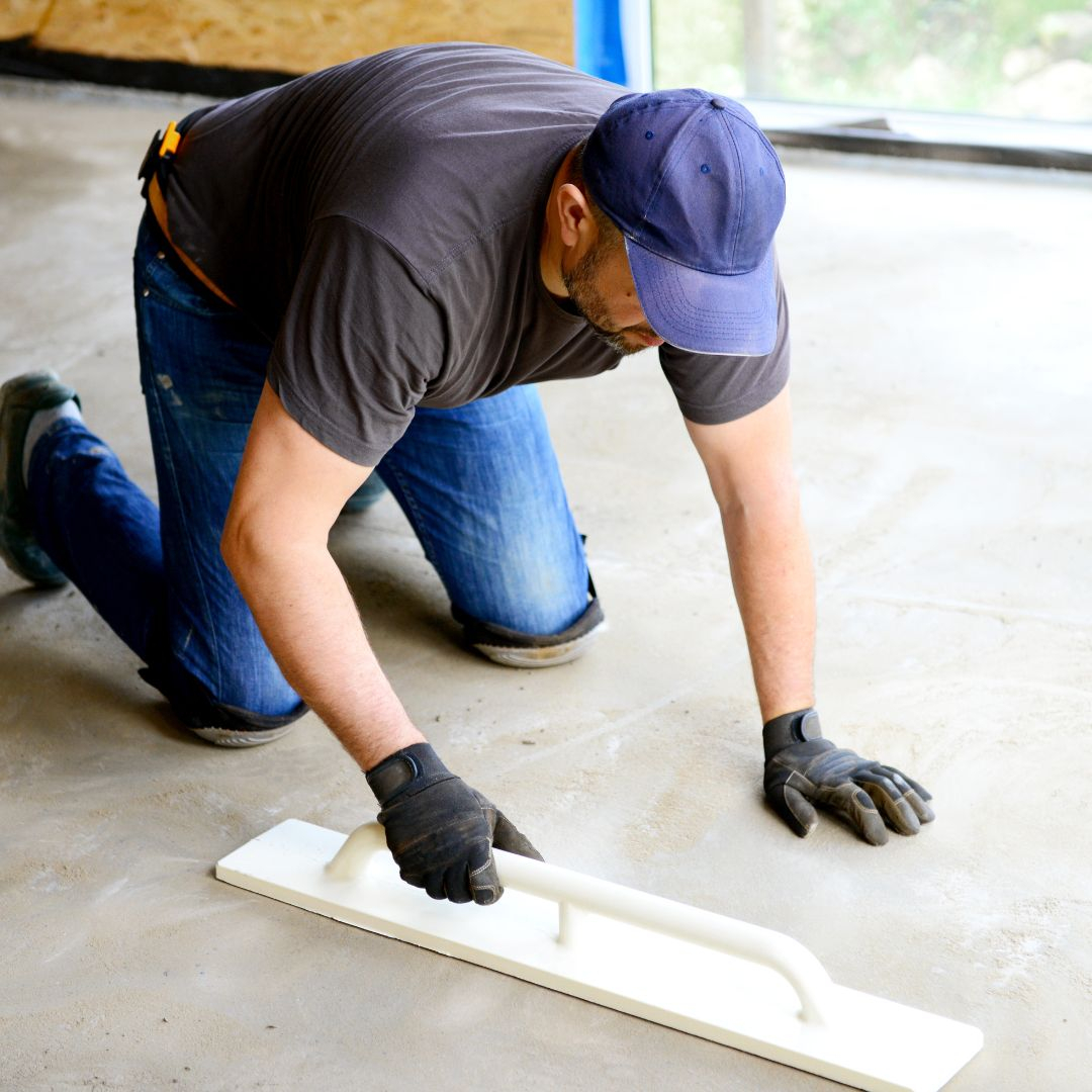 Person putting in epoxy flooring