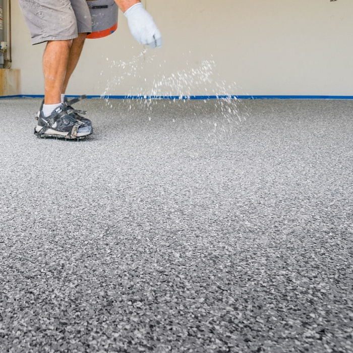 concrete floor coating being poured