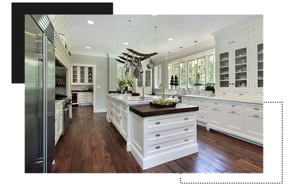 photo of a big kitchen with white cabinets