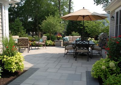 Outdoor Patio Area with Seating and Umbrella