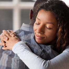 Happy-mixed-race-woman-hug-black-man-husband.jpg-263x263.png