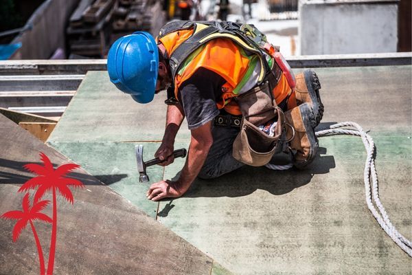 Roofer at work. Roofer at work.