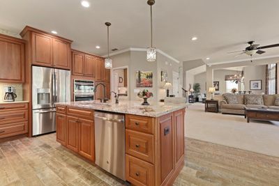 kitchen-island-rotated-to-face-the-family-room-reduced-to-one-level-and-enlarged-west-designs-full-service-k-b-designer-builder-img~42610b6d0f7289ea_8-8446-1-1672ec4.jpg