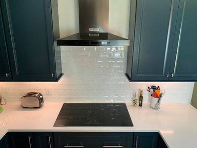 kitchenaid-hood-and-5-burner-glass-induction-cooktop-west-designs-full-service-k-b-designer-builder-img~86a162430eb7436b_8-5114-1-e38aa79.jpg