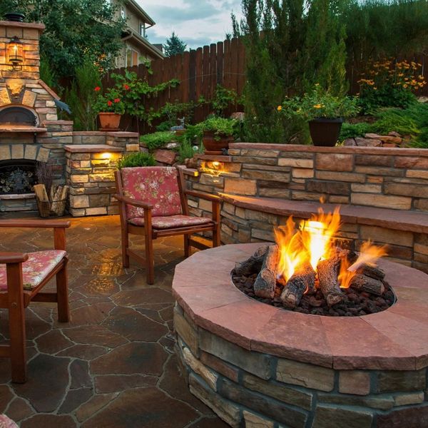 hardscaped backyard area with fire pit