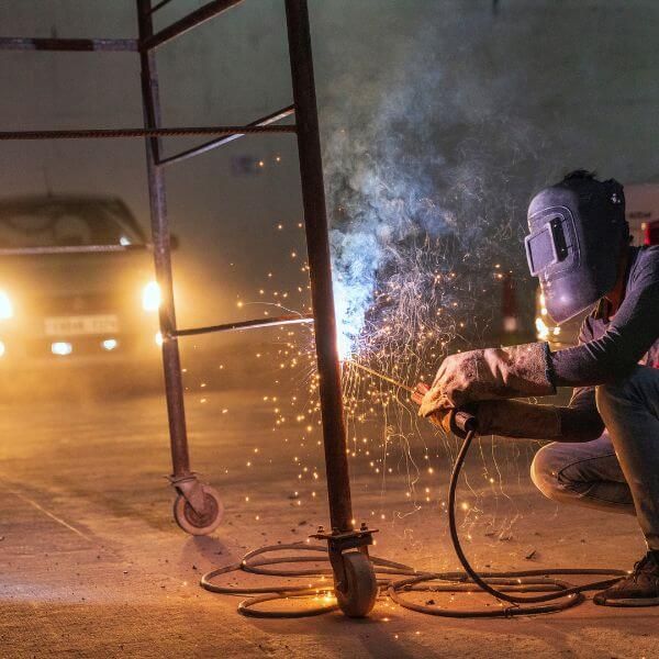 man welding