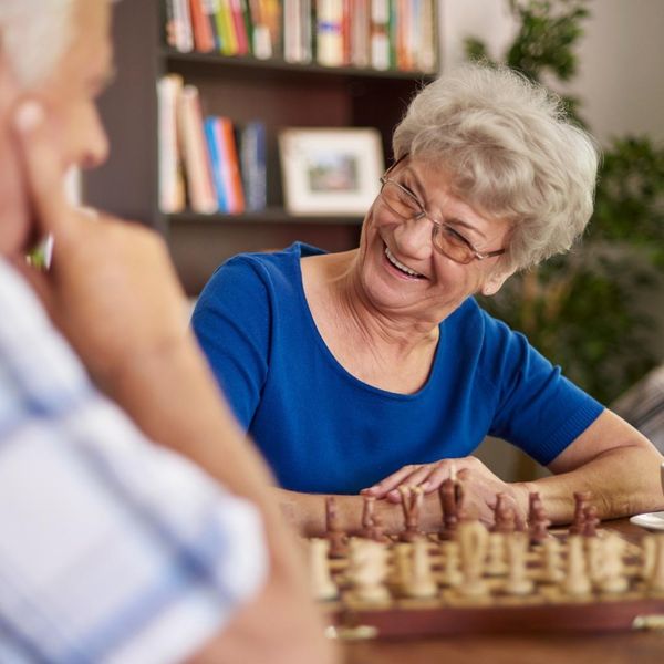 Image of an elderly woman playing a game