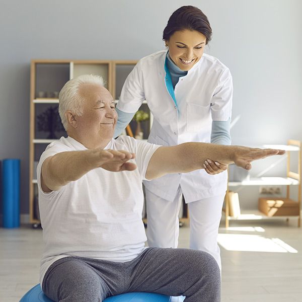 woman helping man with therapy