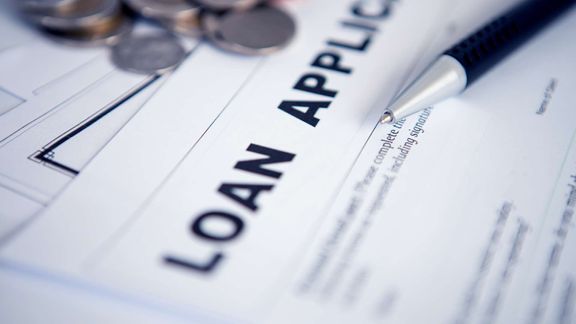 Common Mistakes to Avoid in Small Business Loan Applications - Featured Image.jpg
