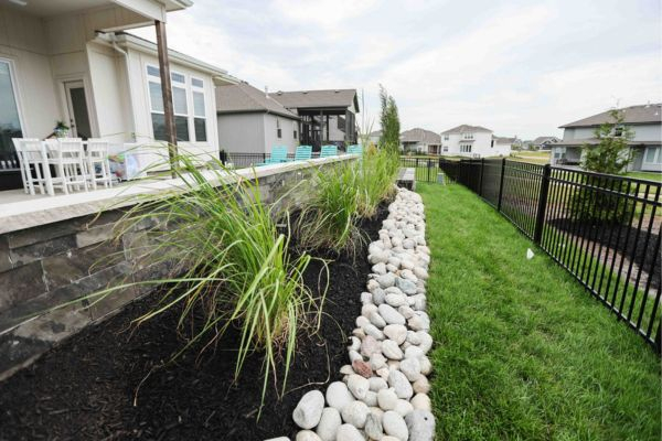Garden beds alongside patio