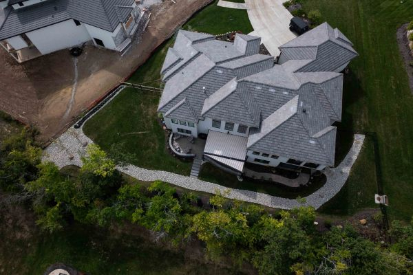 Birds eye view of landscaped house
