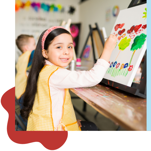 a girl painting in class