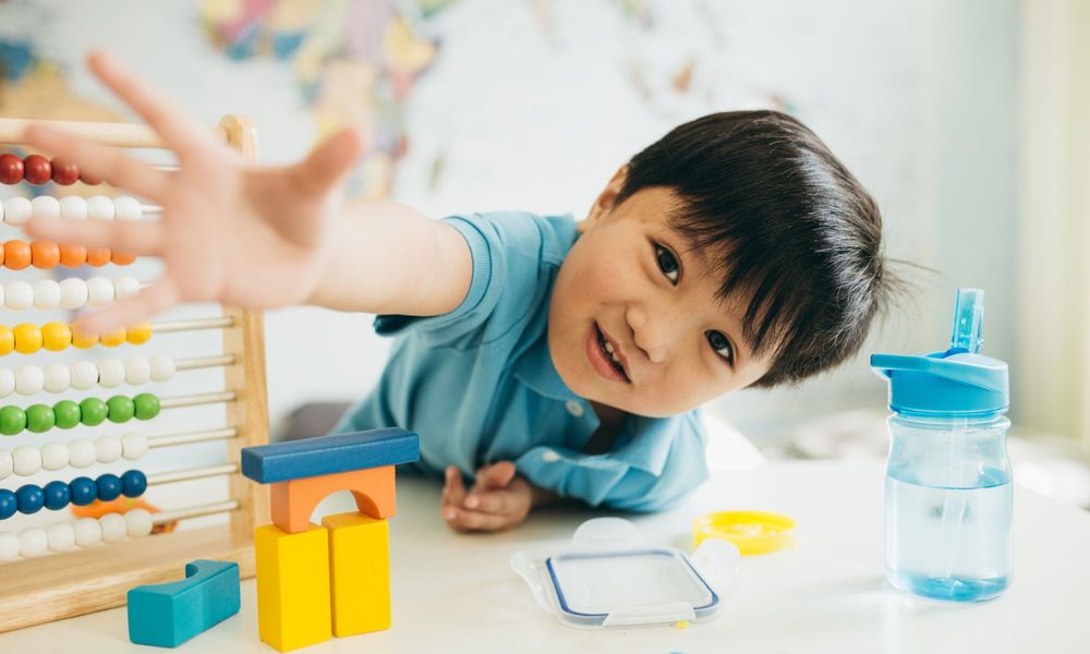 toddler playing with toys