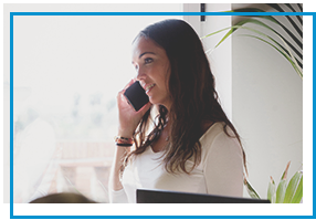 woman on cell phone smiling