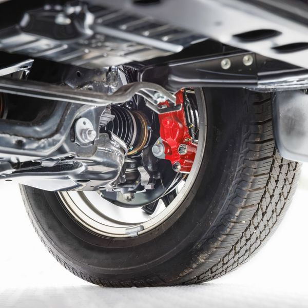 Close up of a car's suspension with the wheel on