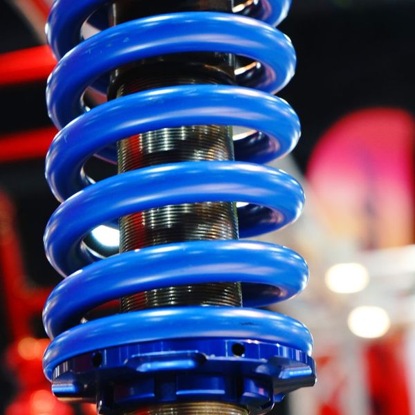 close up of a coilover suspension component