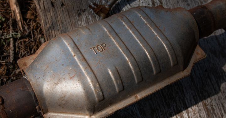 catalytic converter on a block of wood