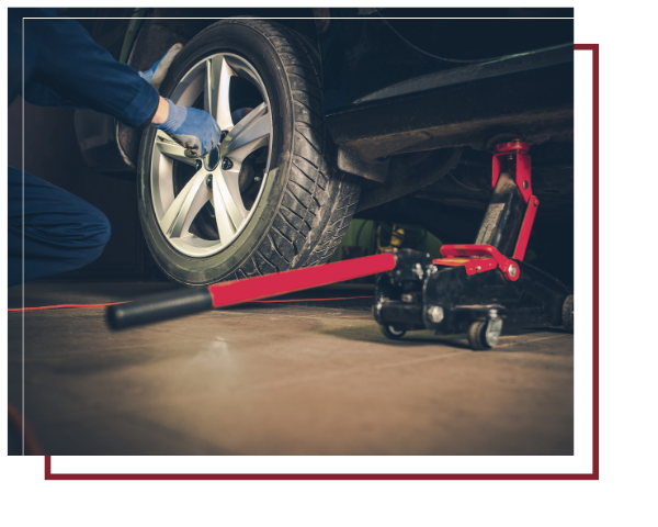 Technician balancing tires