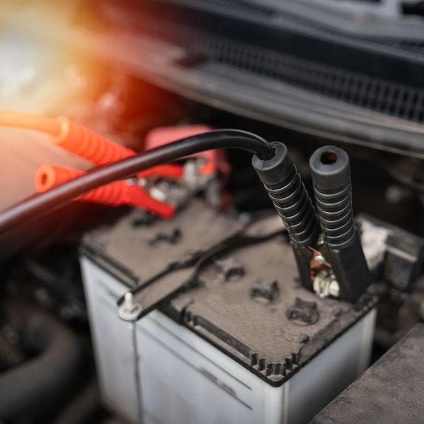 car battery with jumper cables