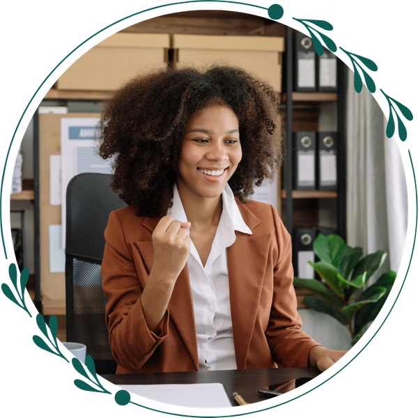 Woman smiling at her desk