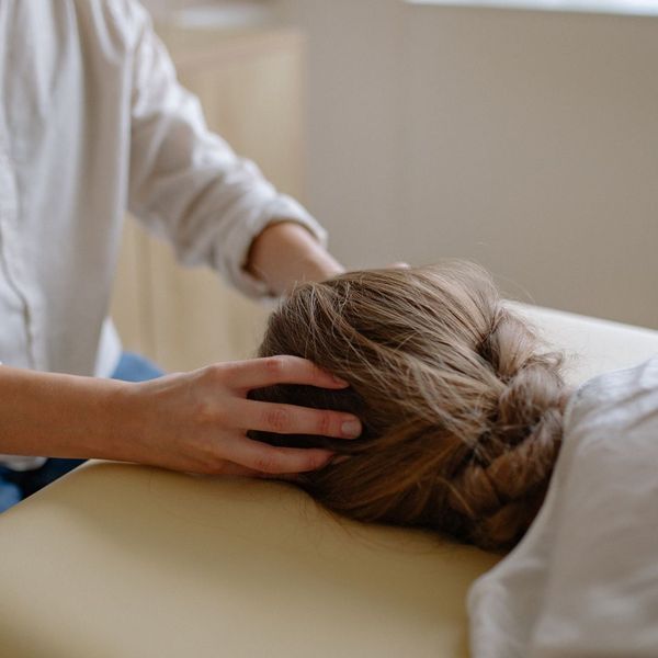 A head massage on a women