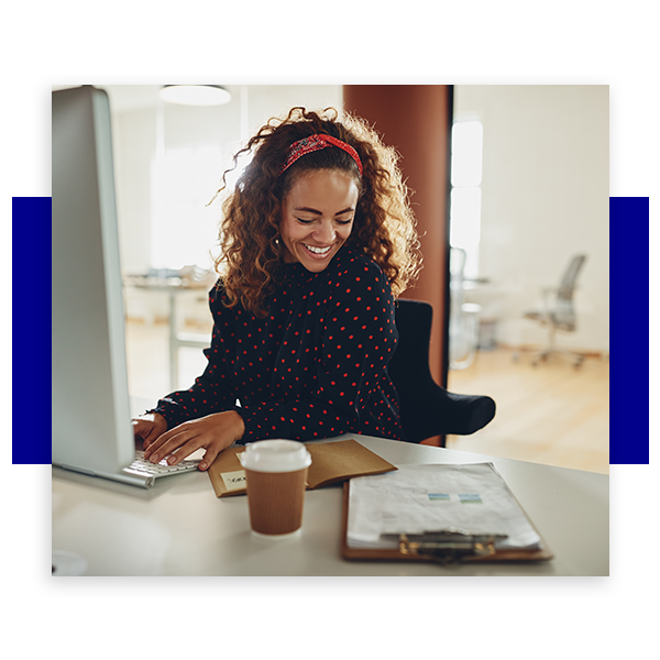 photo of woman working on her computer