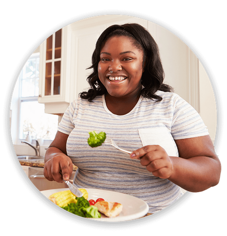 a woman eating healthy food