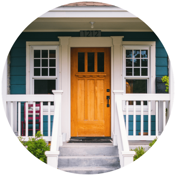 wood front door to home