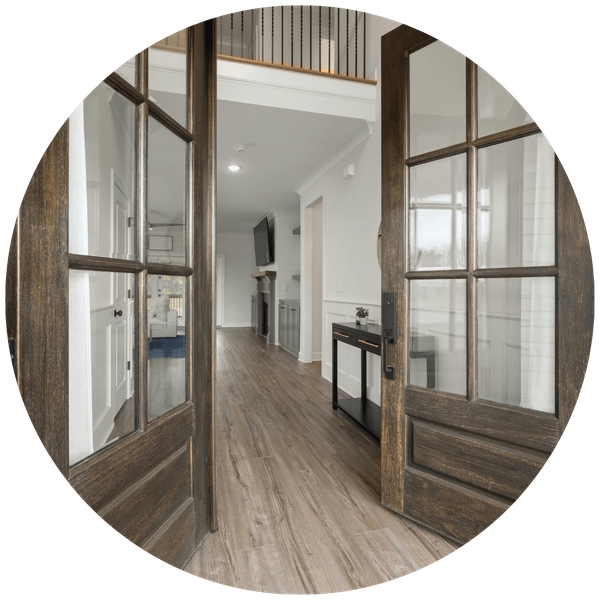 wood doors opening up to modern home