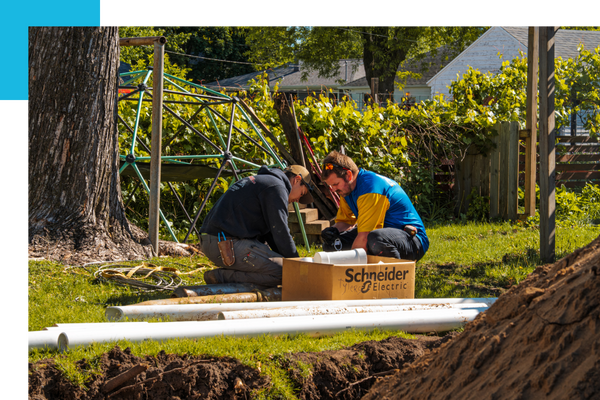 plumbers installing new pipes in ground plumbers installing new pipes in ground