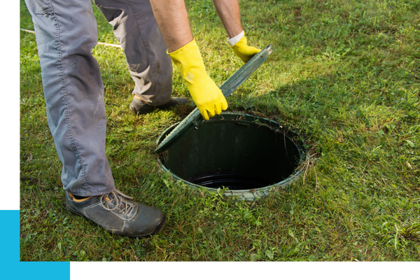 a person checking a sewer Onalaska Septic Systems (4).png