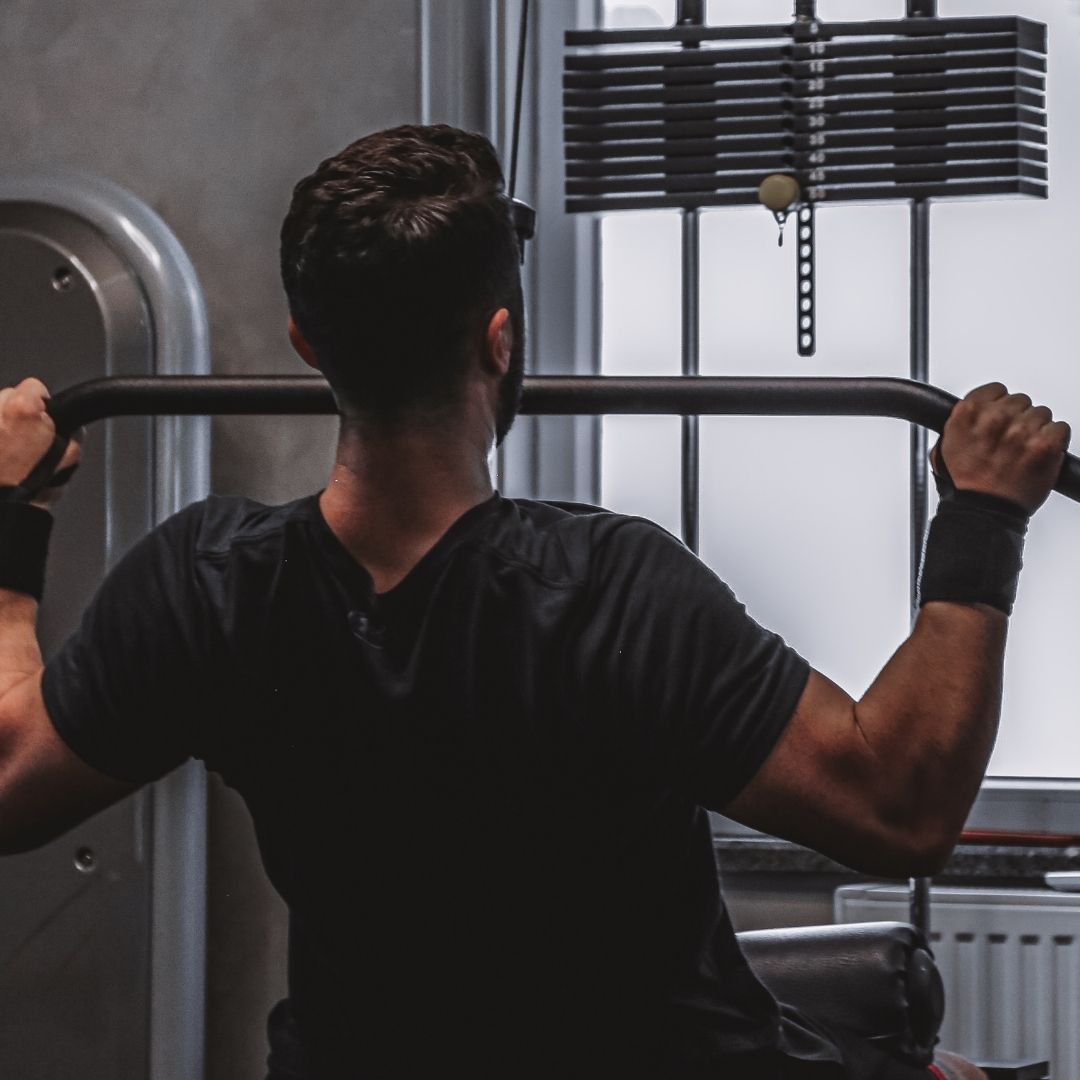guy lifting weights at a fitness center