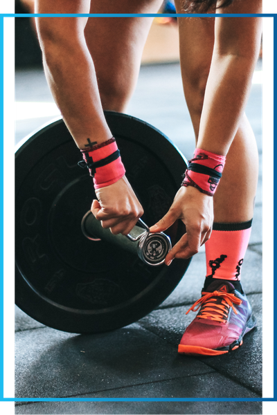 Women adjusting weights
