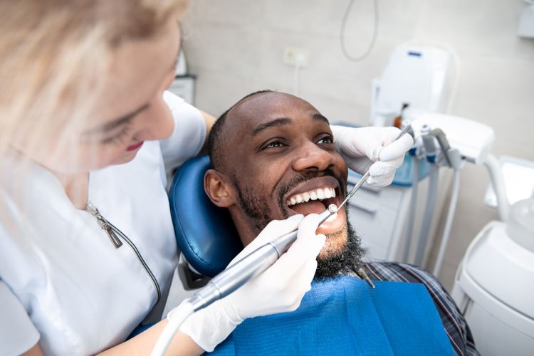 Img of someone getting dental work