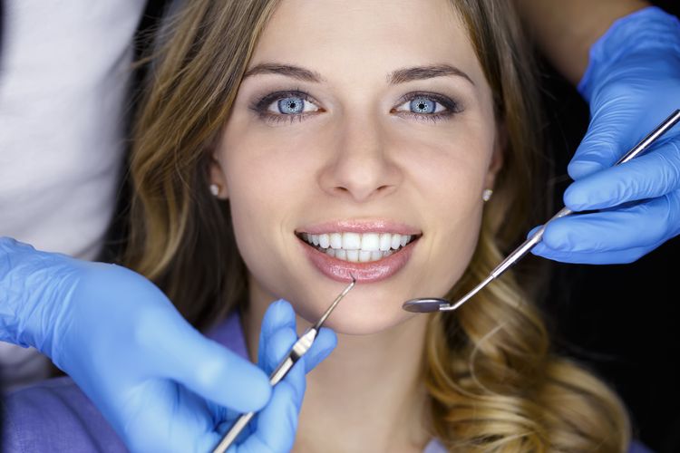 Img of someone getting dental work