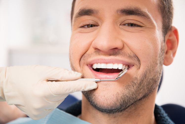 Img of someone getting dental work