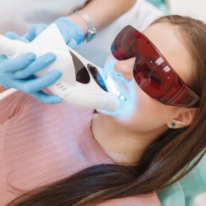 Teeth whitening at the dentist with UV light