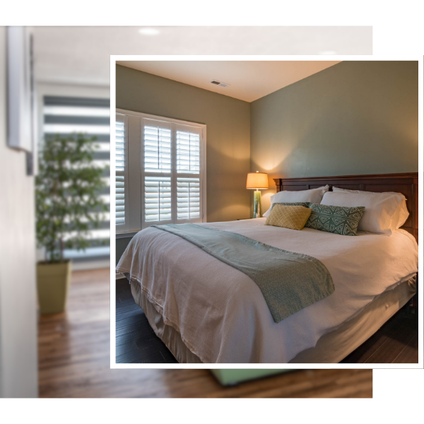 white shutters inside of bedroom