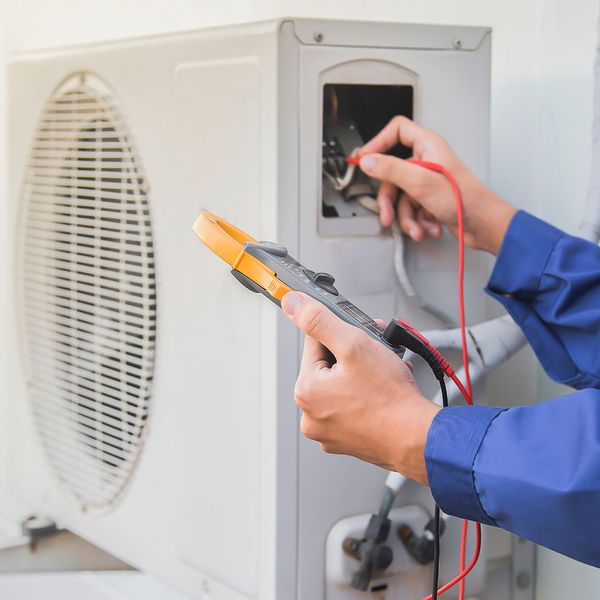 image of an HVAC tech
